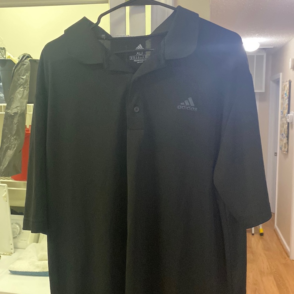 Plain black adidas polo. Never worn